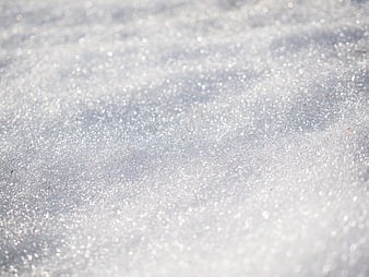 Sparkling Snow Crystals Close-Up Winter Background