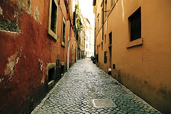 Narrow cobblestone alley in old European town