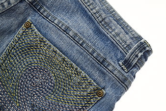Close-up of Blue Denim Jeans Pocket with Yellow Stitching