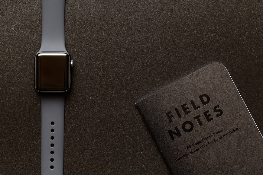 Minimalist Apple Watch and Field Notes Notebook Flat Lay