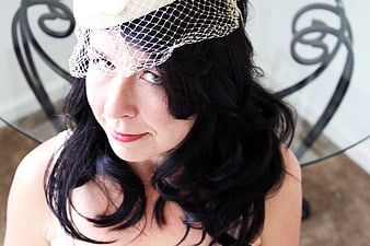 Woman in Vintage Fascinator Hat Portrait