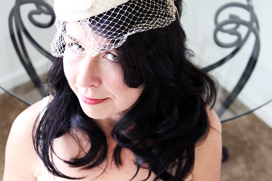 Woman in Vintage Fascinator Hat Portrait