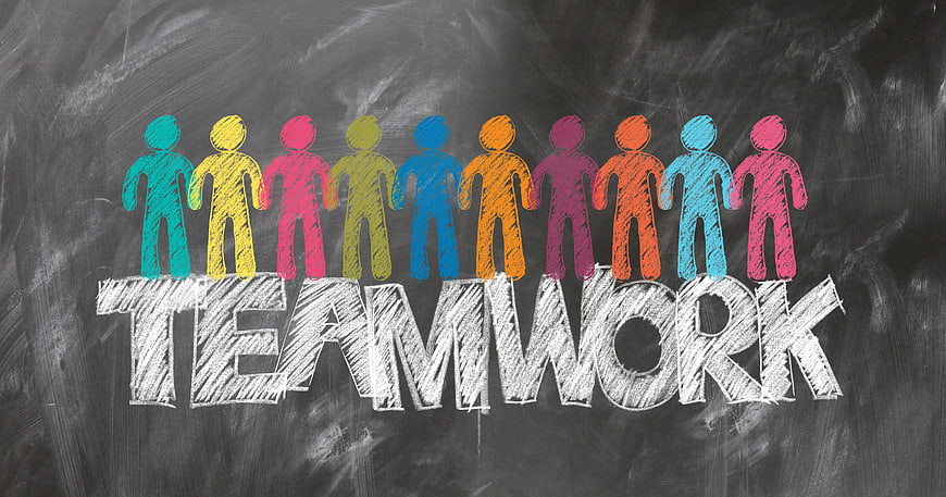 Colorful Chalk Teamwork Illustration on Blackboard