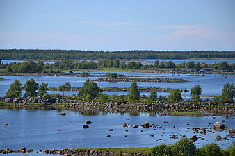 Scenic summer landscape of rocky islands and blue water