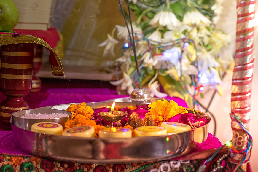 Hindu Pooja Thali with Diya, Flowers, and Incense