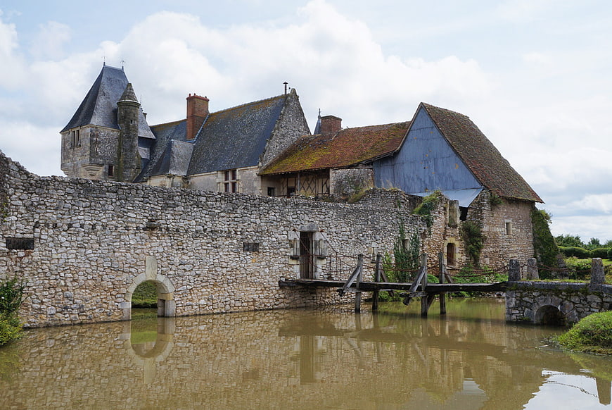 Historic French Chateau with Stone Walls and Moat