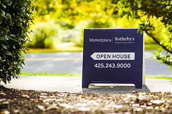 Sotheby's International Realty Open House Sign on Sidewalk