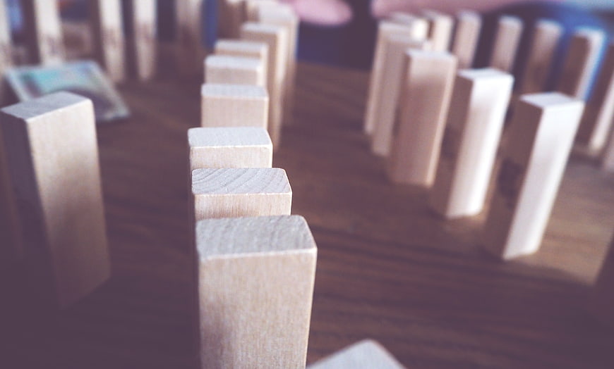 Close-up of wooden blocks arranged in a Jenga game