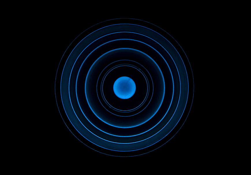 Abstract Blue Concentric Circles on Black Background