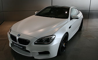 White BMW M6 Coupe in Modern Showroom