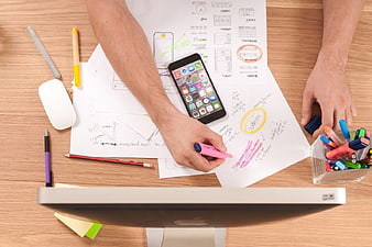 Top View of UX Designer Working on Wireframes