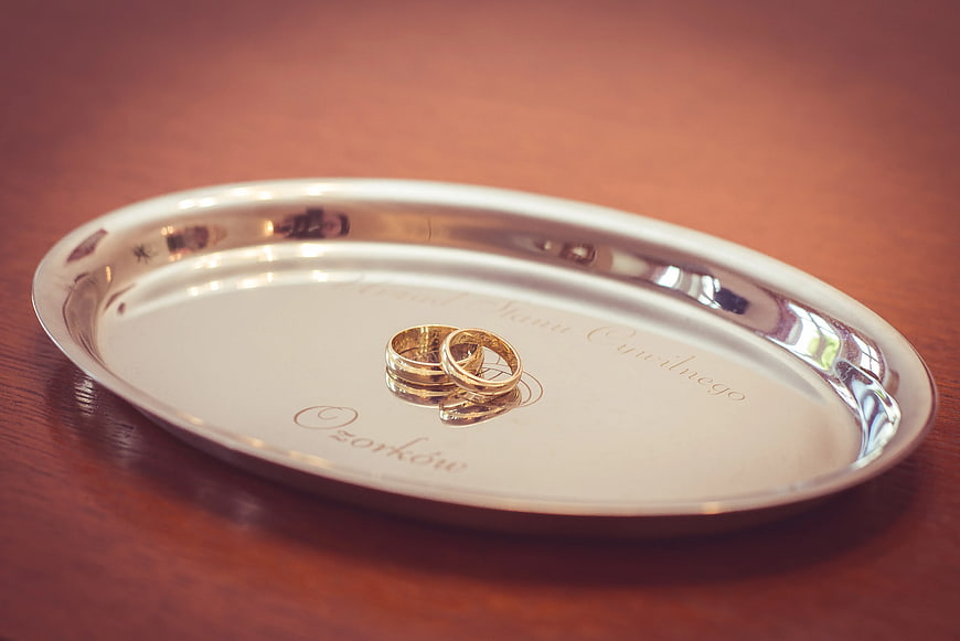 Gold Wedding Rings on Engraved Silver Tray
