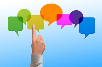 Hand Selecting Colorful Speech Bubbles On Blue Gradient Background