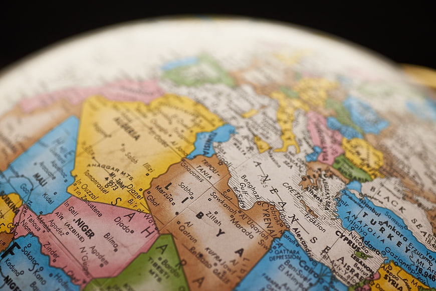 Close-up of a colorful globe map focusing on North Africa and the Middle East