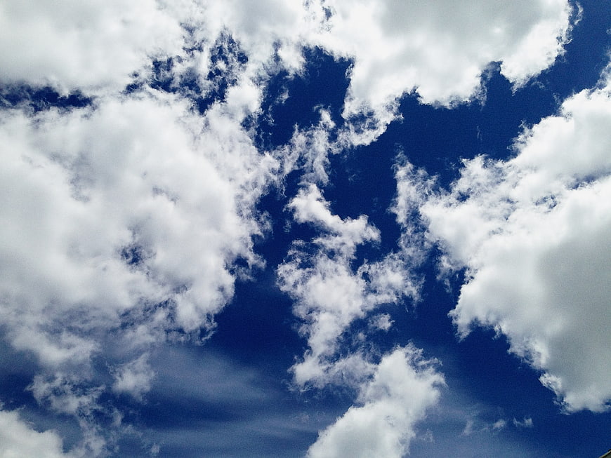 Dramatic Blue Sky with Fluffy White Cumulus Clouds