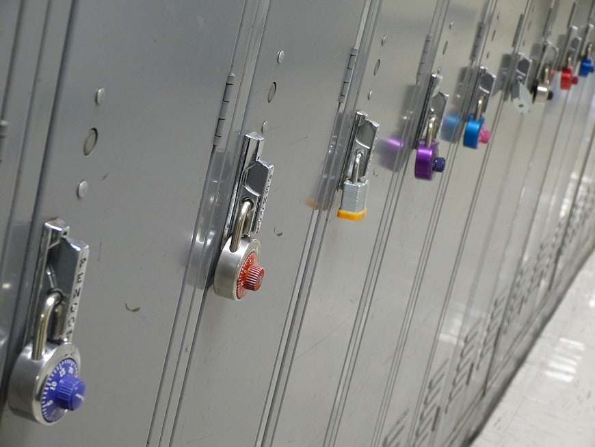 Row of Gray School Lockers with Colorful Combination Locks