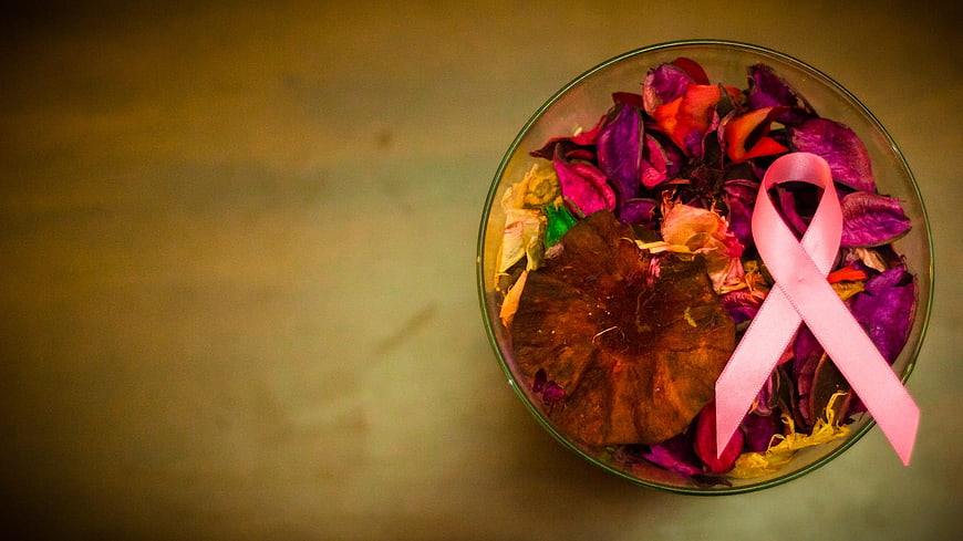 Pink Ribbon in Bowl of Dried Flowers for Breast Cancer Awareness