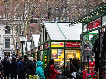 Crowded Holiday Market Stalls in Urban City Square