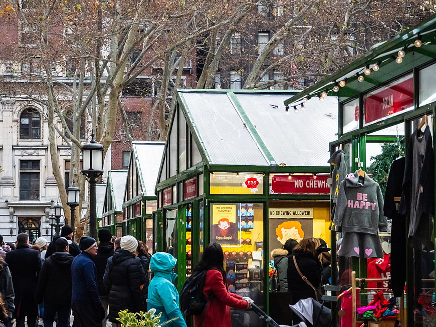 Crowded Holiday Market Stalls in Urban City Square