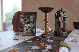 Steampunk wedding table centerpiece with vintage decorations