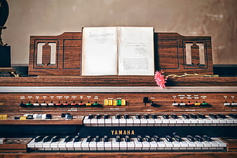 Vintage Yamaha Electone Organ with Sheet Music and Flower