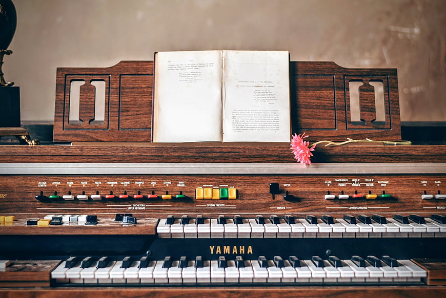 Vintage Yamaha Electone Organ with Sheet Music and Flower