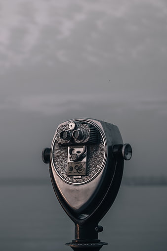 Vintage Coin-Operated Binoculars by the Sea
