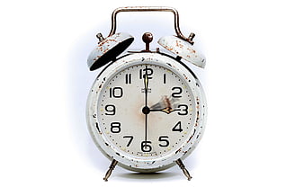 Vintage Rusty White Alarm Clock on White Background