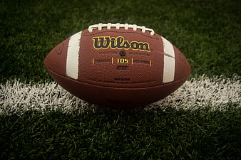 Wilson American Football on Artificial Turf Field