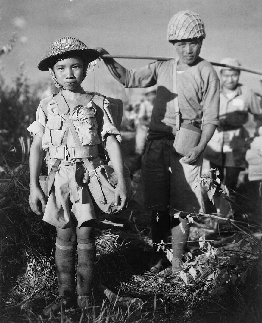 Historical black and white photo of young Chinese child soldiers