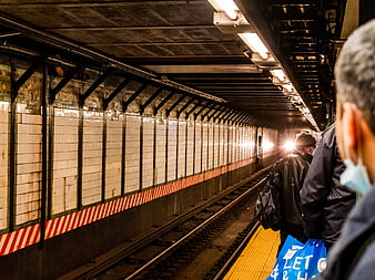 Subway Train Approaching Underground Station Platform