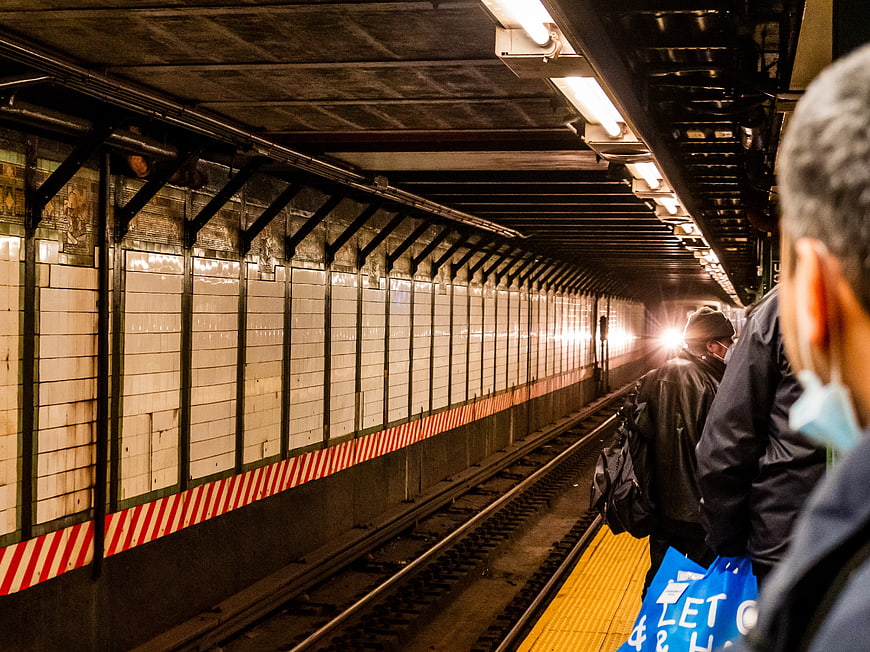 Subway Train Approaching Underground Station Platform