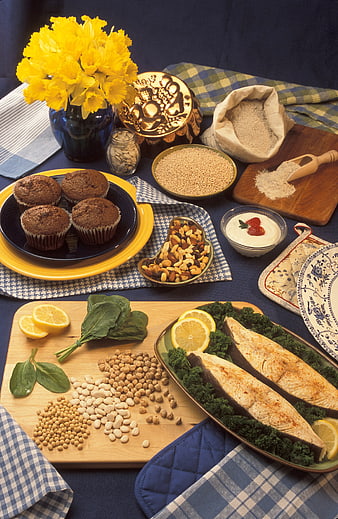 Healthy Magnesium-Rich Meal Spread With Fish, Muffins, and Daffodils