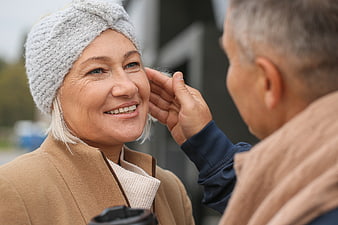 Senior couple sharing affectionate moment outdoors