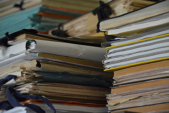Stacked Bureaucratic Paper Files And Documents In Office Archive
