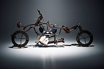Handcrafted Metal Sculpture of a Motorcycle Made from Wire and Nails