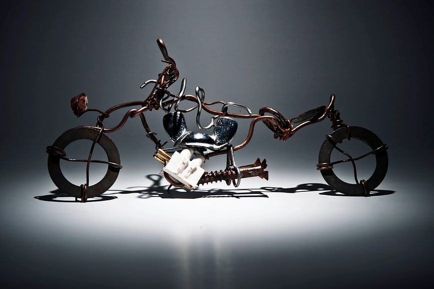 Handcrafted Metal Sculpture of a Motorcycle Made from Wire and Nails