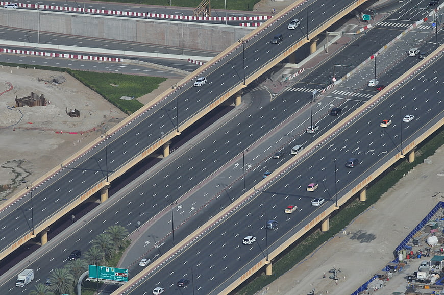 Aerial view of multi-lane highway interchange with traffic