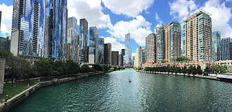 Chicago River Skyline with Skyscrapers and Blue Sky