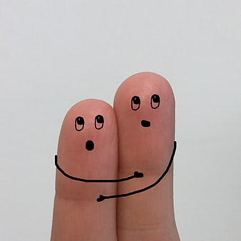Two fingers drawn as a couple hugging with surprised faces
