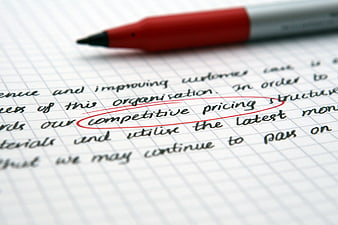 Competitive pricing circled in red on handwritten business strategy document