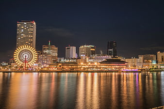 Night Skyline of Yokohama with Ferris Wheel and Water Reflections