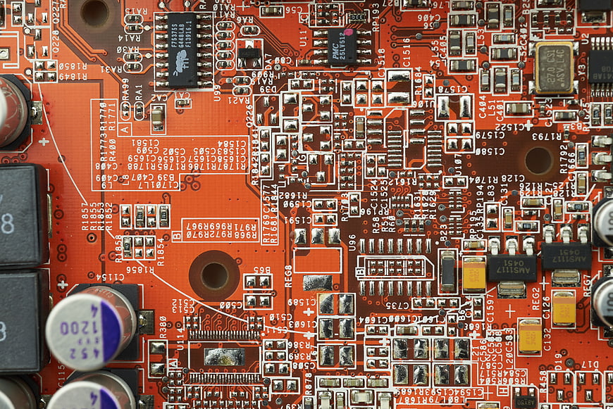Close-up of Red Electronic Circuit Board with Microchips