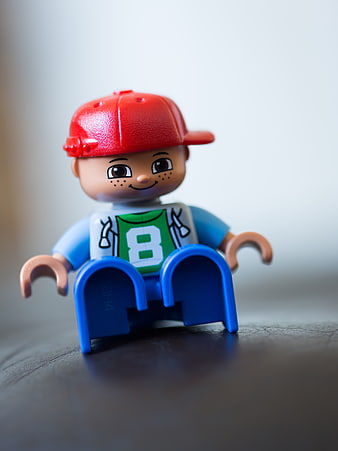 Close-up of Playmobil Figure with Red Cap and Jersey