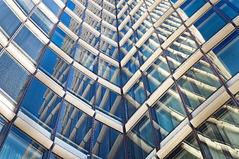 Abstract geometric pattern of modern glass skyscraper facade