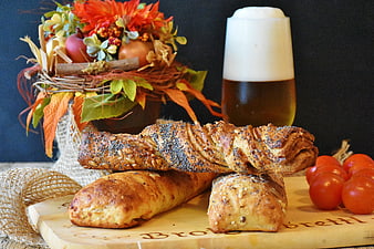 Artisan Bread Loaves with Beer and Autumn Decor