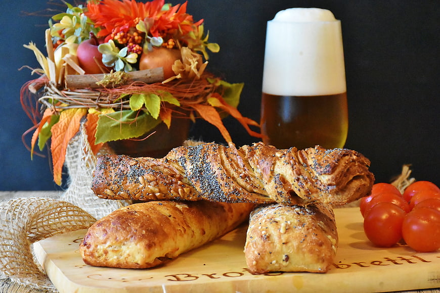 Artisan Bread Loaves with Beer and Autumn Decor