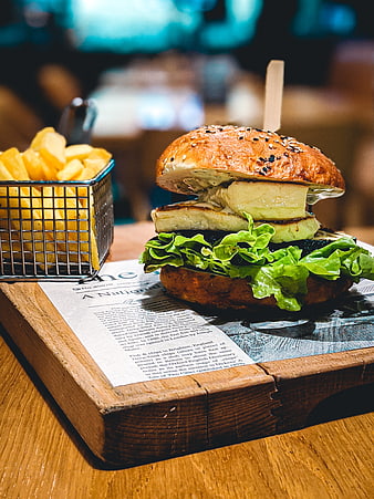 Halloumi Burger with Fries on Wooden Board