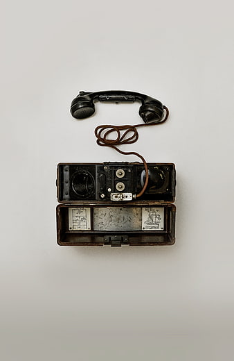 Vintage Military Field Telephone on White Background