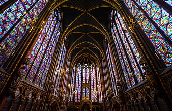 Interior of Gothic Cathedral with Vibrant Stained Glass Windows